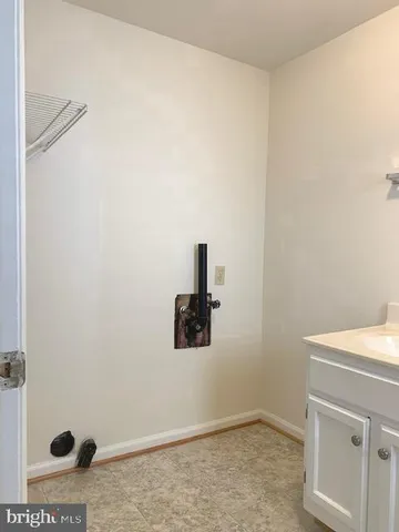 a bathroom with a sink and a vanity
