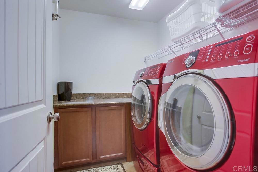 620 Key Lime Way Escondido, CA 92027 - Photo 18 of 24 a utility room with dryer and washer