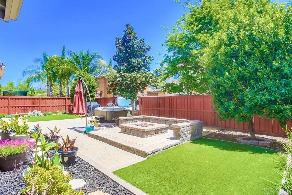 620 Key Lime Way Escondido, CA 92027 - Photo 24 of 24 a view of a backyard with sitting area