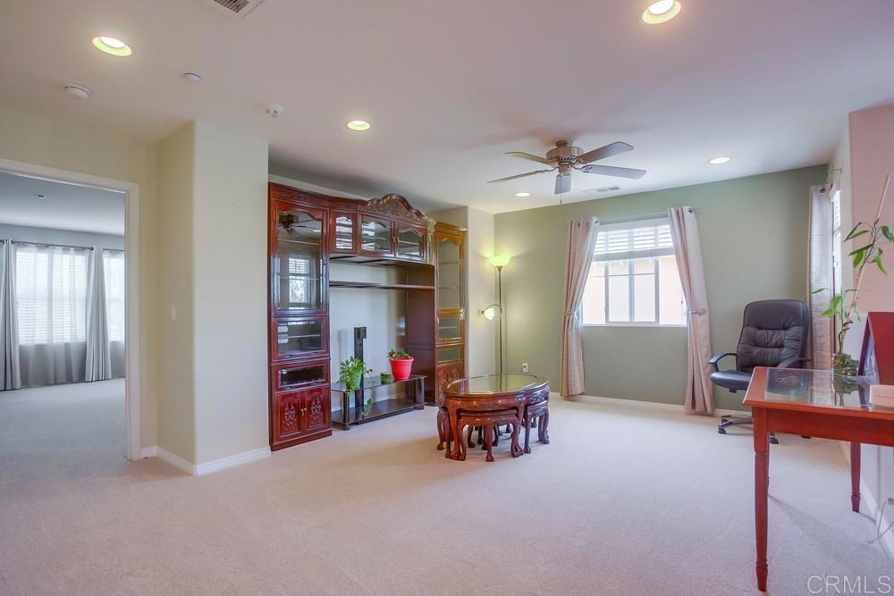 620 Key Lime Way Escondido, CA 92027 - Photo 9 of 24 a living room with furniture and a chandelier