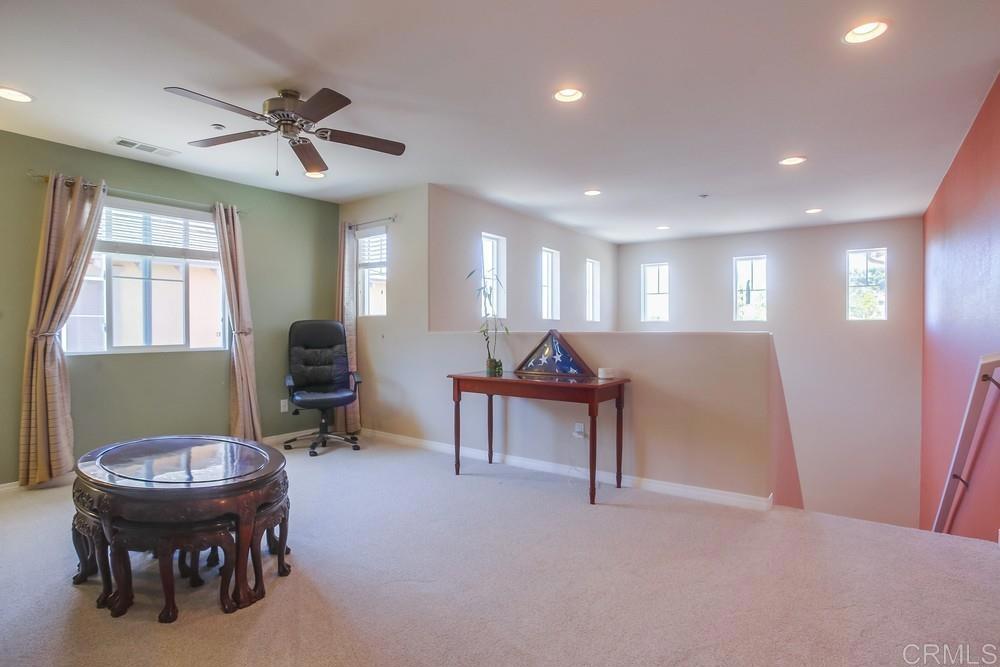 620 Key Lime Way Escondido, CA 92027 - Photo 10 of 24 a view of a livingroom with furniture and a chandelier
