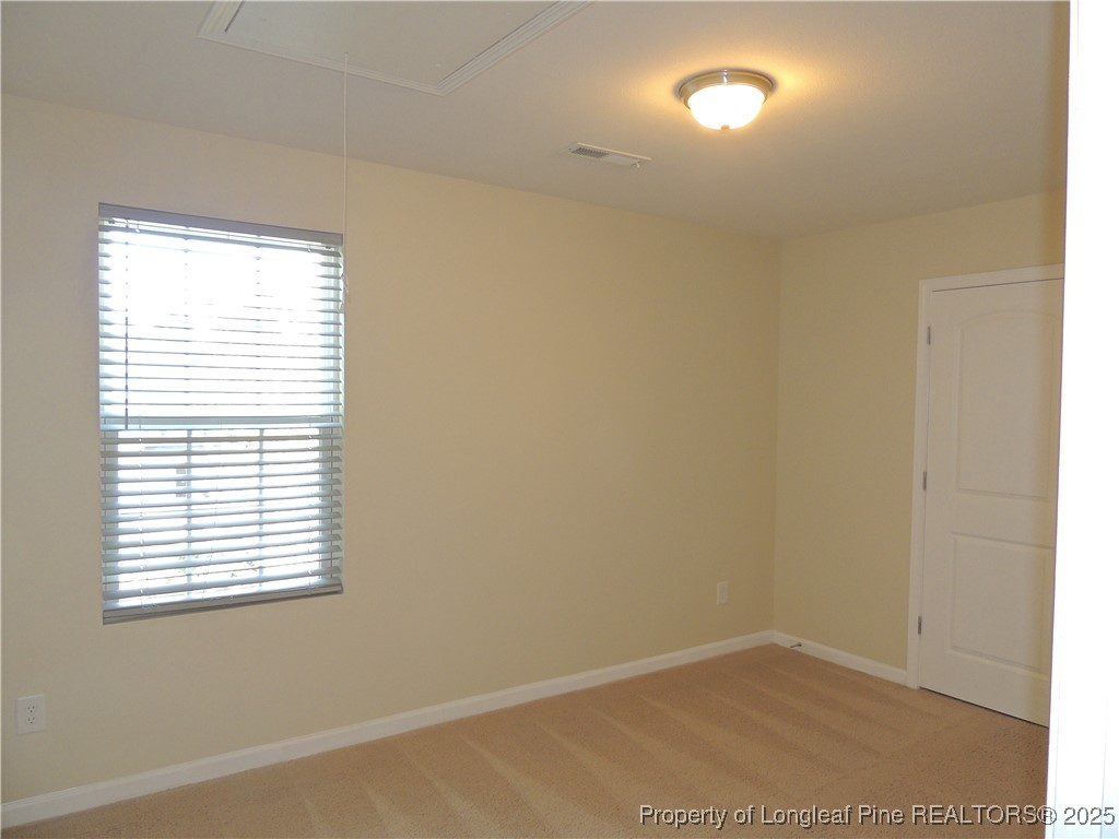 46 Hallow Oak Street Spring Lake, NC 28390 - Photo 12 of 22 an empty room with a window