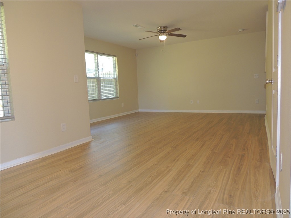 46 Hallow Oak Street Spring Lake, NC 28390 - Photo 7 of 22 wooden floor in an empty room
