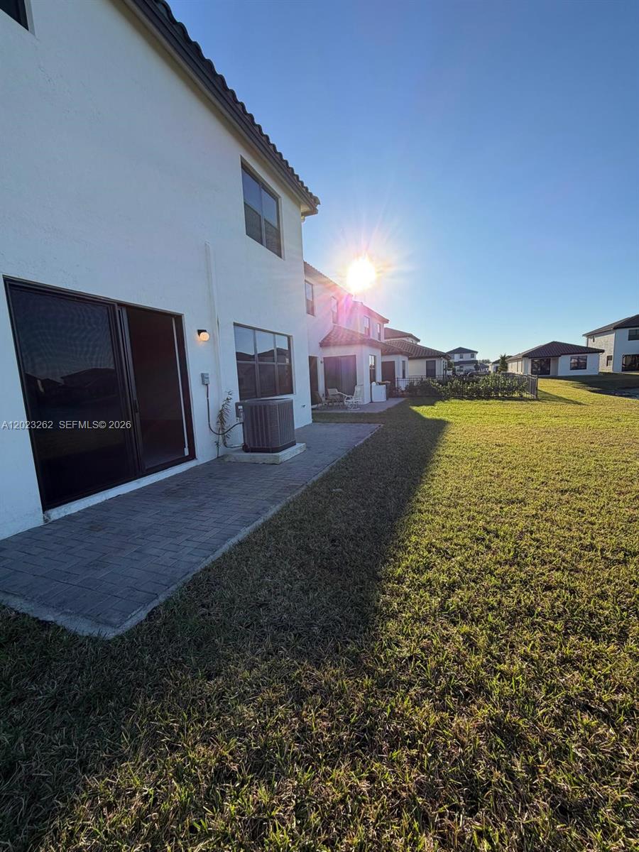 5669 Cerva Lane, Unit 5669 Immokalee, FL 34142 - Photo 31 of 32 a view of an ocean & house
