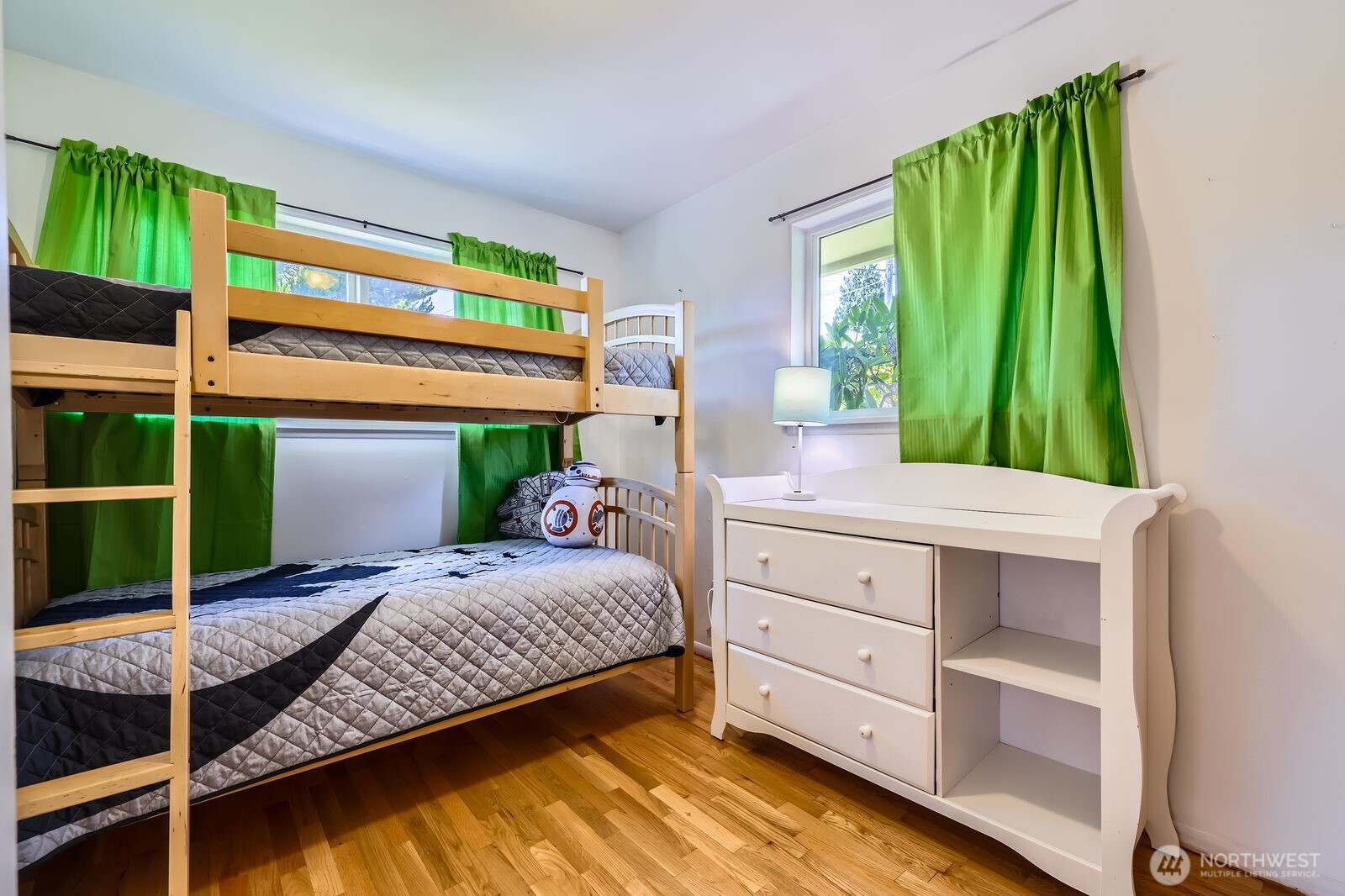 7924 South 112th Street Seattle, WA 98178 - Photo 19 of 40 a bedroom with a bed and a window