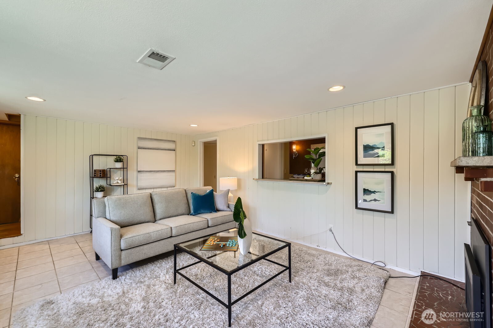 7924 South 112th Street Seattle, WA 98178 - Photo 22 of 40 a living room with furniture and a flat screen tv