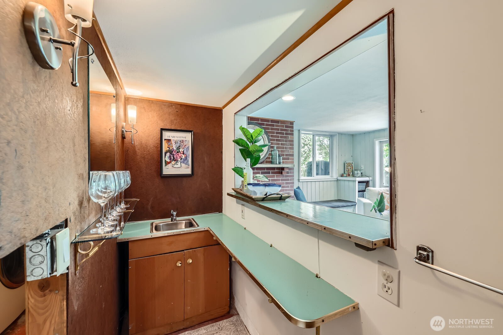 7924 South 112th Street Seattle, WA 98178 - Photo 24 of 40 a bathroom with a sink a mirror and a bathtub