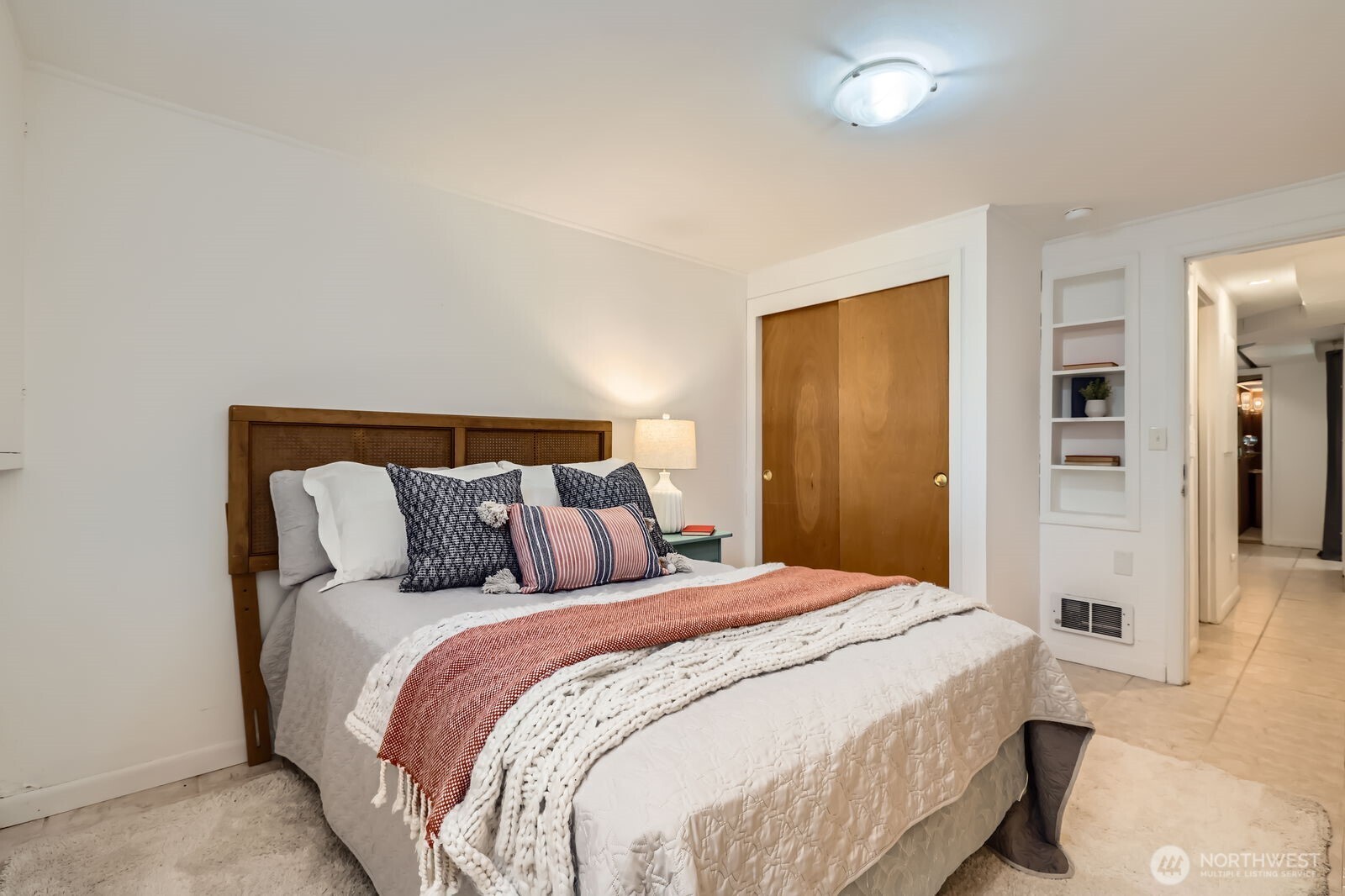7924 South 112th Street Seattle, WA 98178 - Photo 27 of 40 a bedroom with a bed and a walk in closet