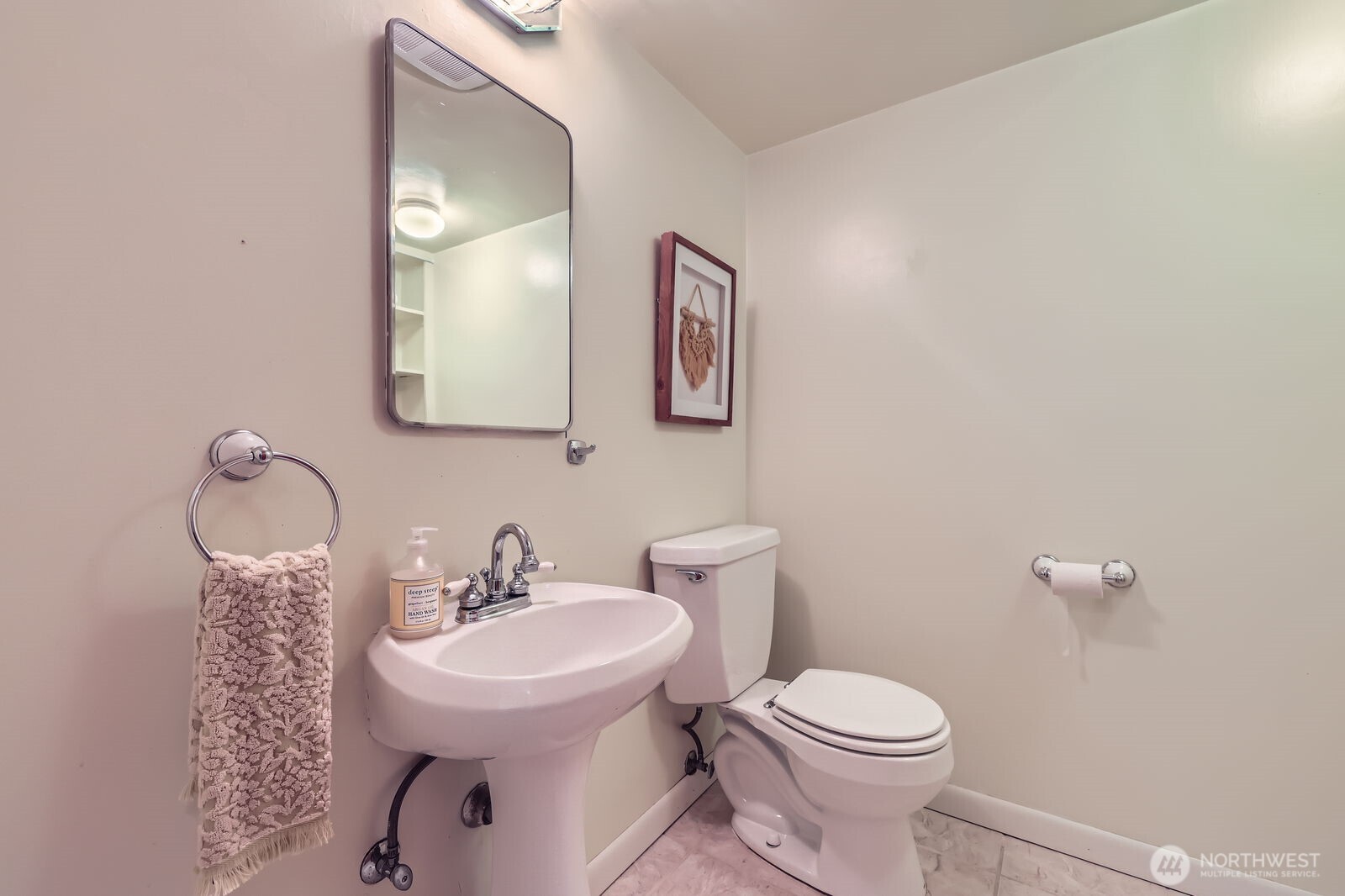 7924 South 112th Street Seattle, WA 98178 - Photo 28 of 40 a bathroom with a toilet sink and mirror