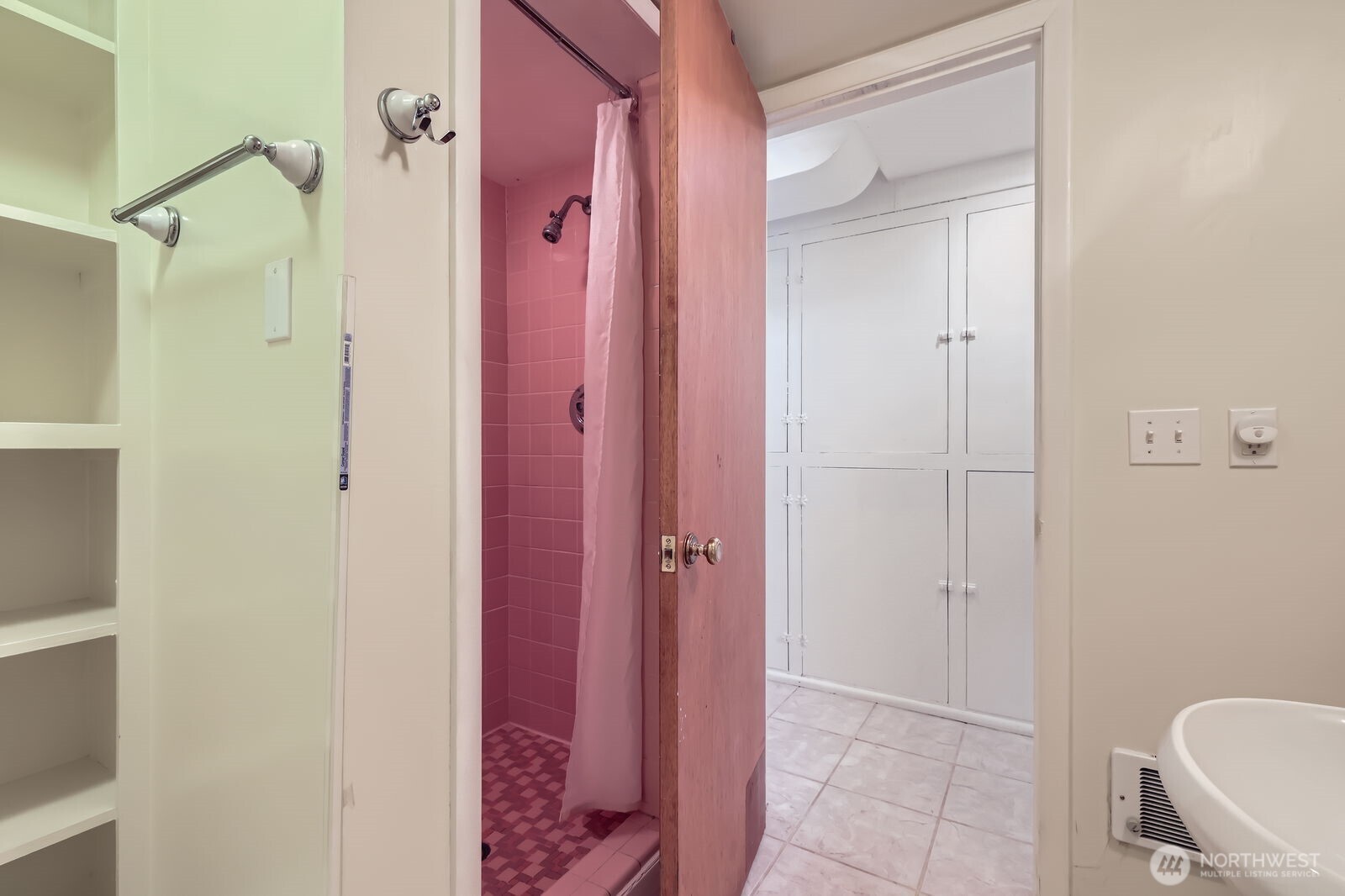 7924 South 112th Street Seattle, WA 98178 - Photo 29 of 40 a bathroom with a shower and a sink