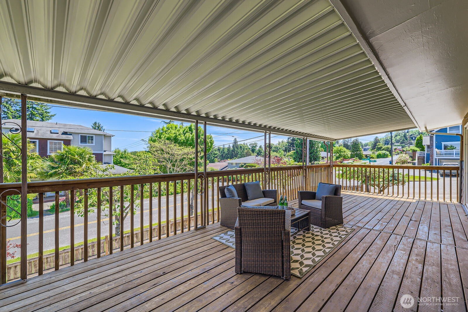 7924 South 112th Street Seattle, WA 98178 - Photo 32 of 40 a roof deck with wooden floor and fence