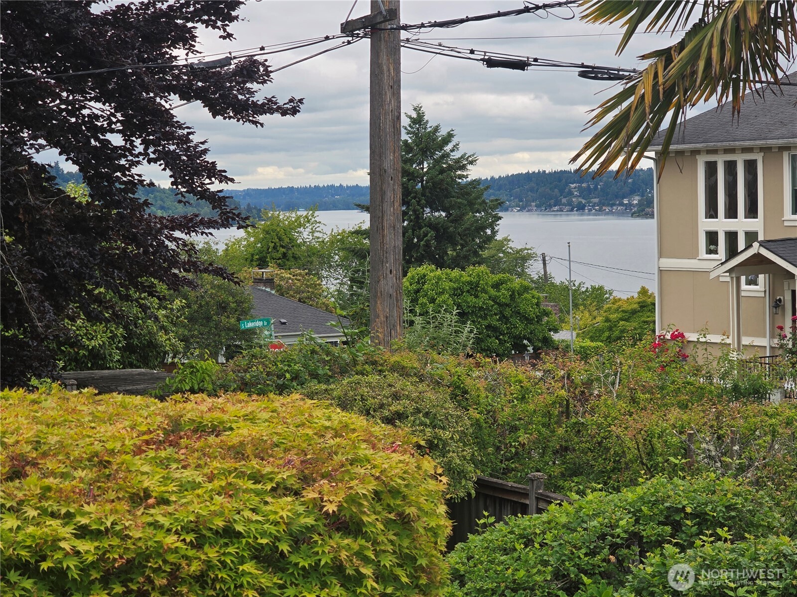 7924 South 112th Street Seattle, WA 98178 - Photo 34 of 40 a view of a house with a yard