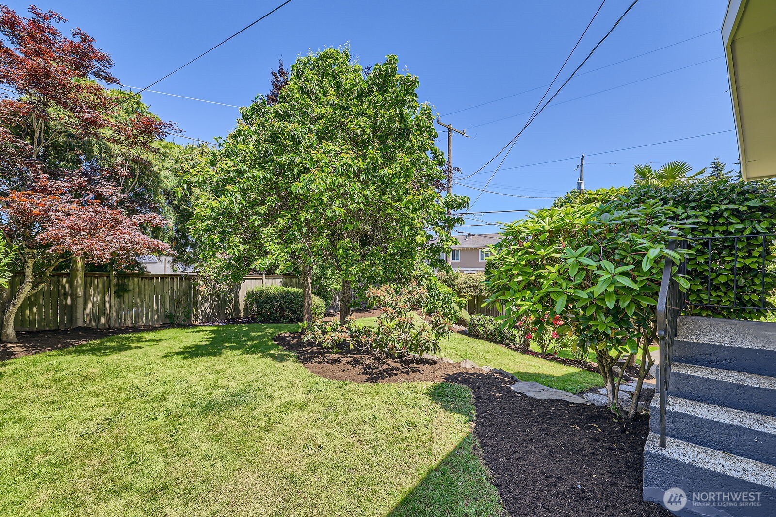 7924 South 112th Street Seattle, WA 98178 - Photo 37 of 40 a backyard of a house with lots of green space