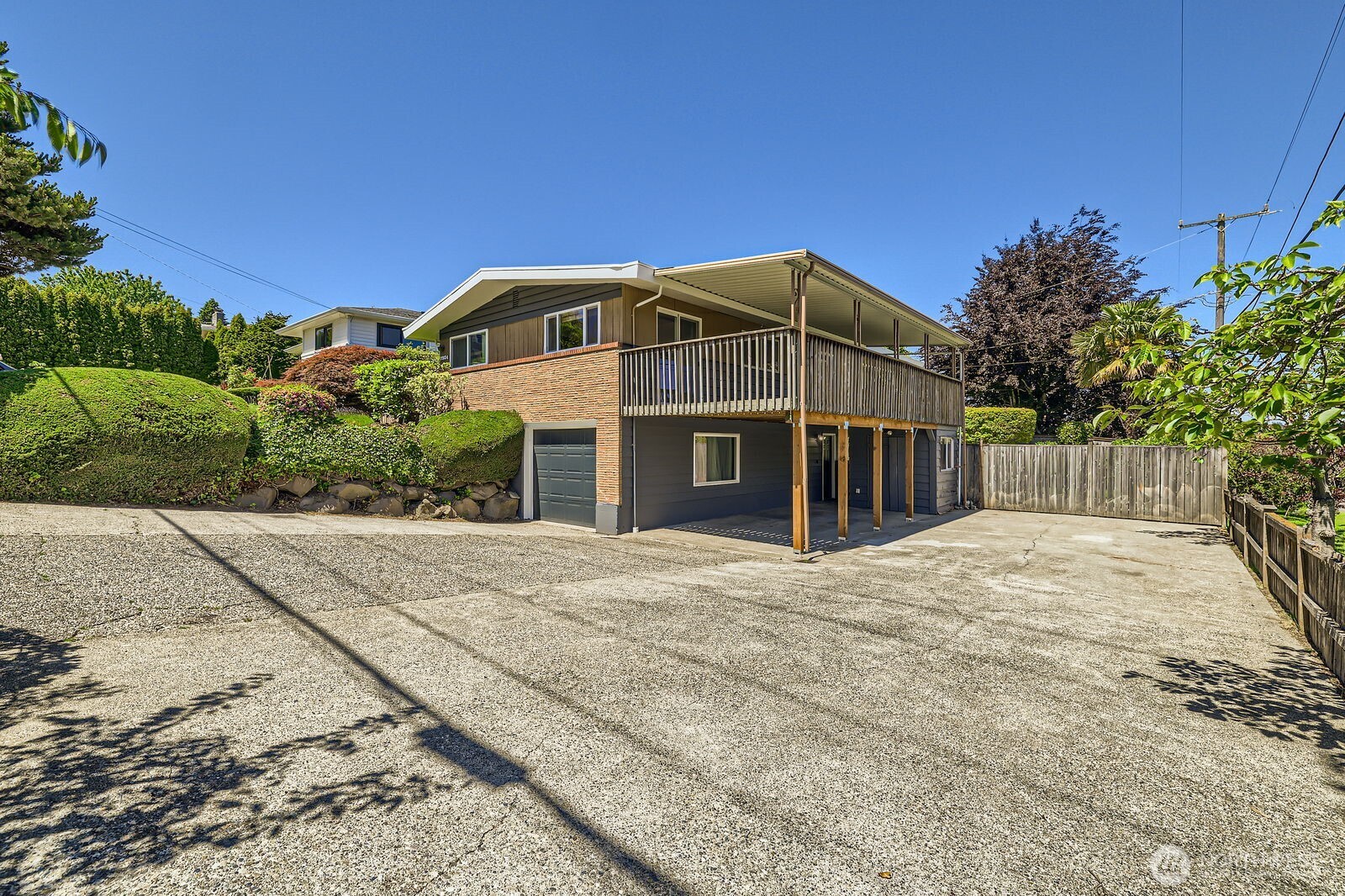 7924 South 112th Street Seattle, WA 98178 - Photo 38 of 40 a front view of a house with a yard