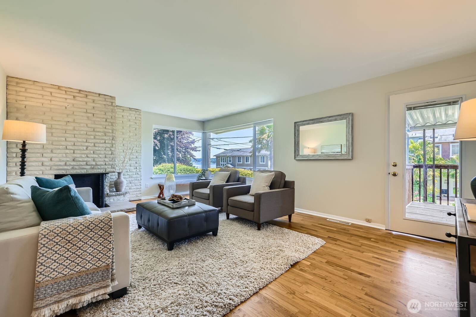 7924 South 112th Street Seattle, WA 98178 - Photo 6 of 40 a living room with furniture and a fireplace