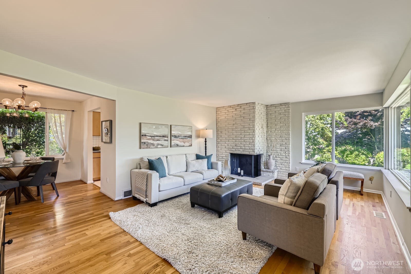 7924 South 112th Street Seattle, WA 98178 - Photo 7 of 40 a living room with furniture and a fireplace