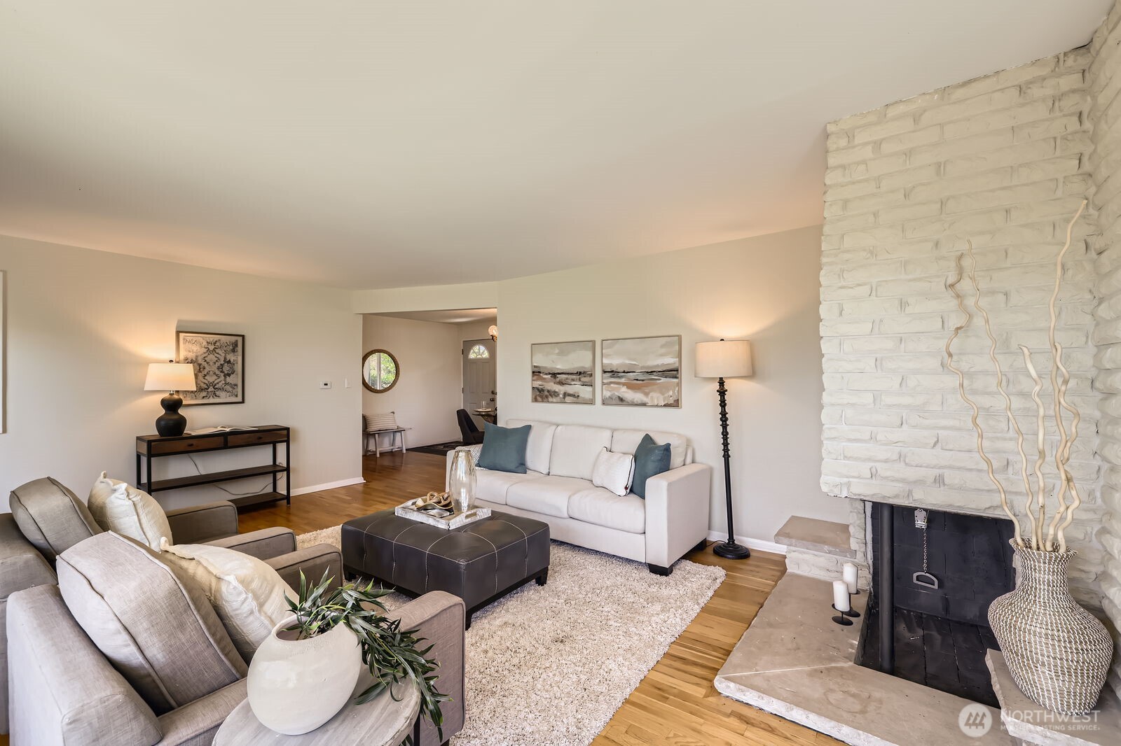7924 South 112th Street Seattle, WA 98178 - Photo 8 of 40 a living room with furniture and a fireplace