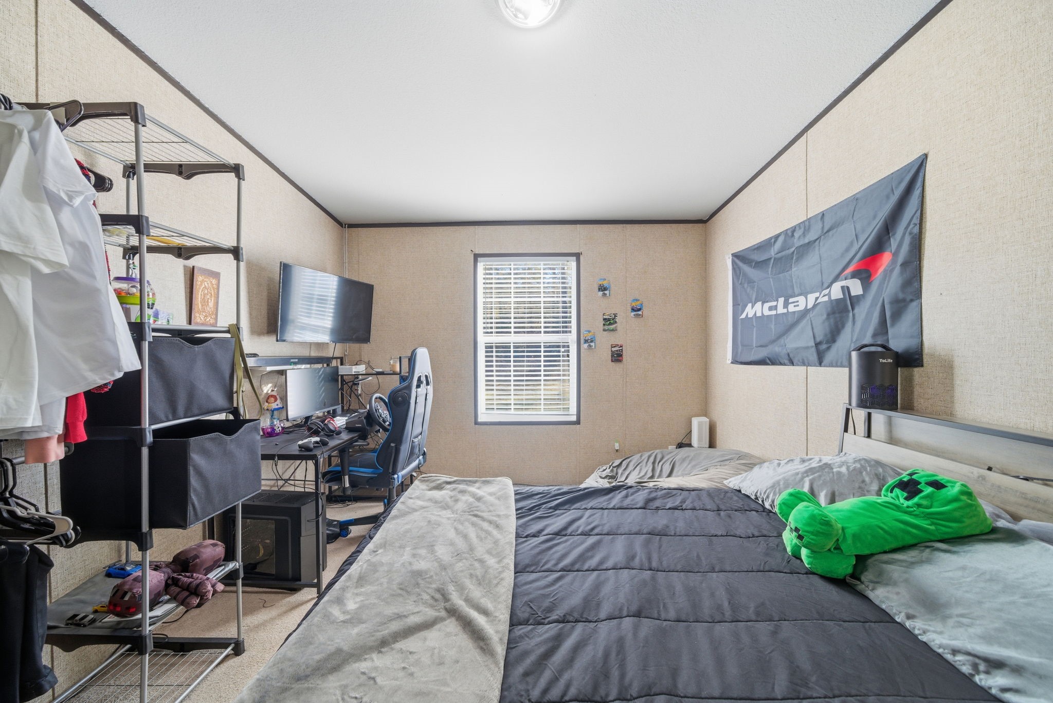 17028 Lively Road Waller, TX 77484 - Photo 7 of 20 a bedroom with furniture and a window