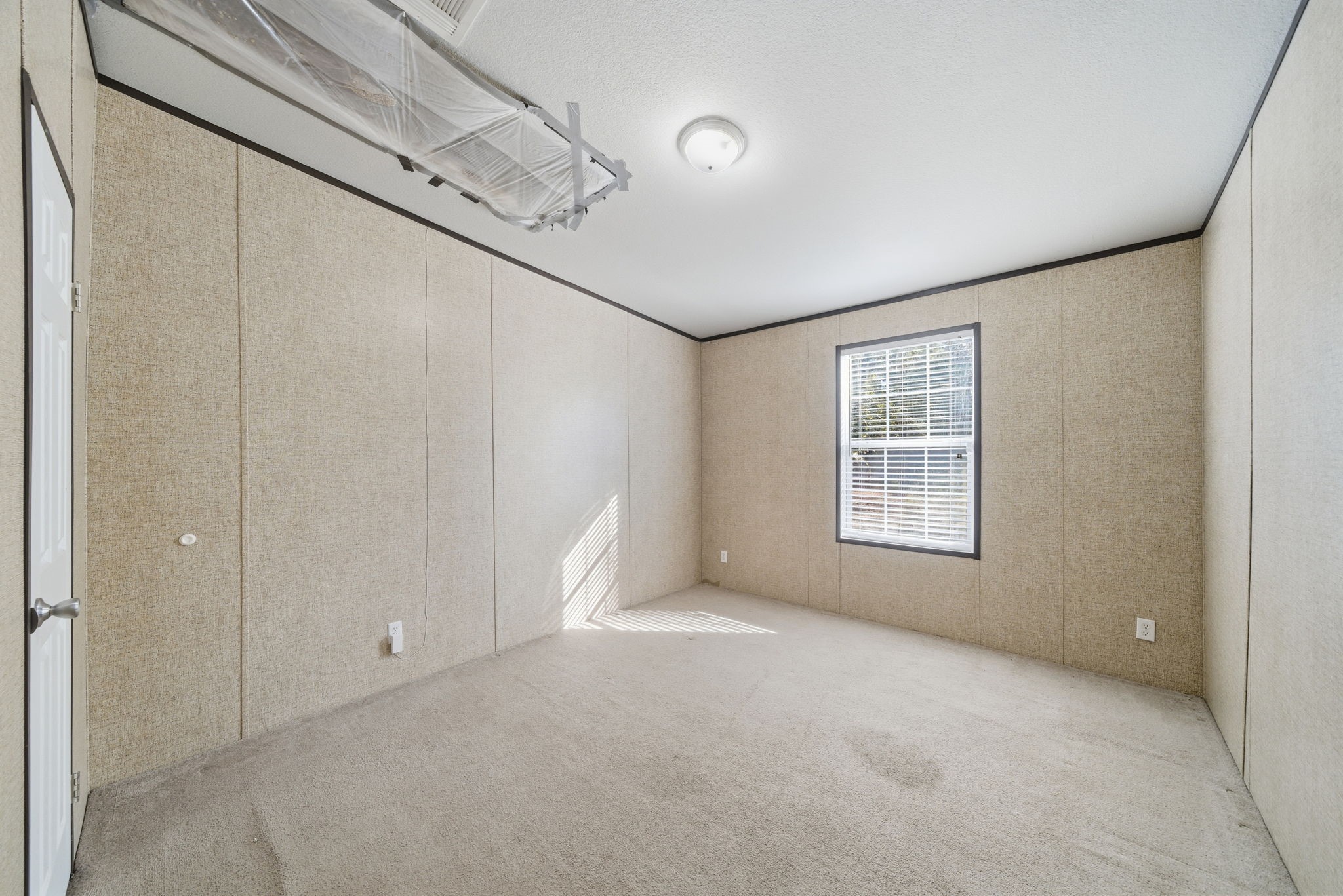 17028 Lively Road Waller, TX 77484 - Photo 9 of 20 a view of an empty room with a window