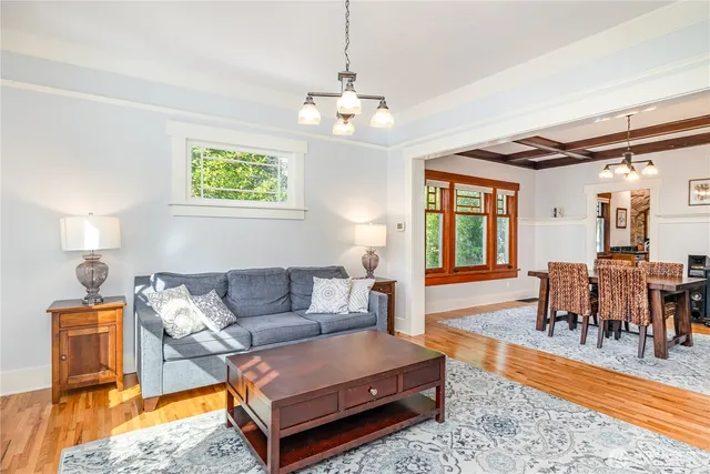 a living room with furniture and a table