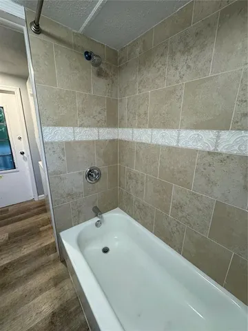 a bathroom with a bathtub