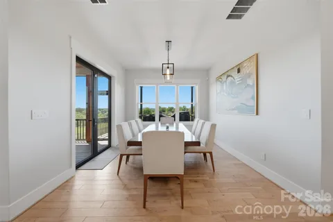 a kitchen with stainless steel appliances a sink a counter space and a window