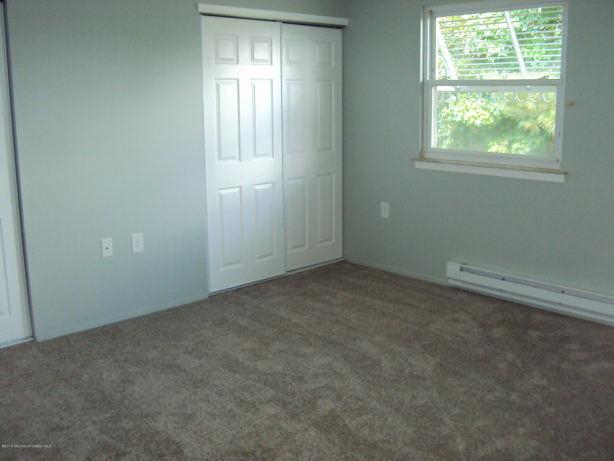 7A Alpine Road, Unit B Whiting, NJ 08759 - Photo 14 of 21 an empty room with windows