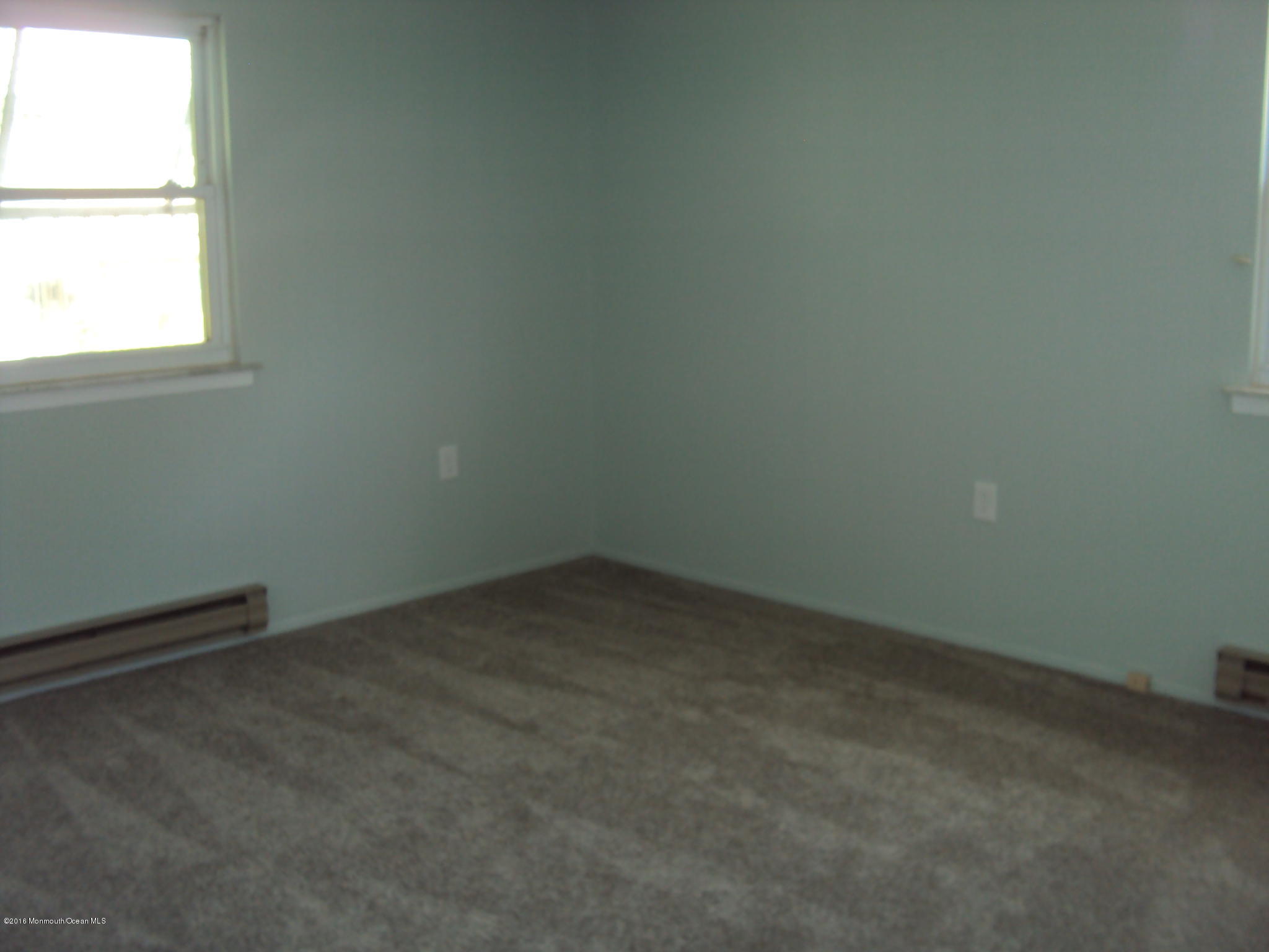 7A Alpine Road, Unit B Whiting, NJ 08759 - Photo 17 of 21 an empty room with a window