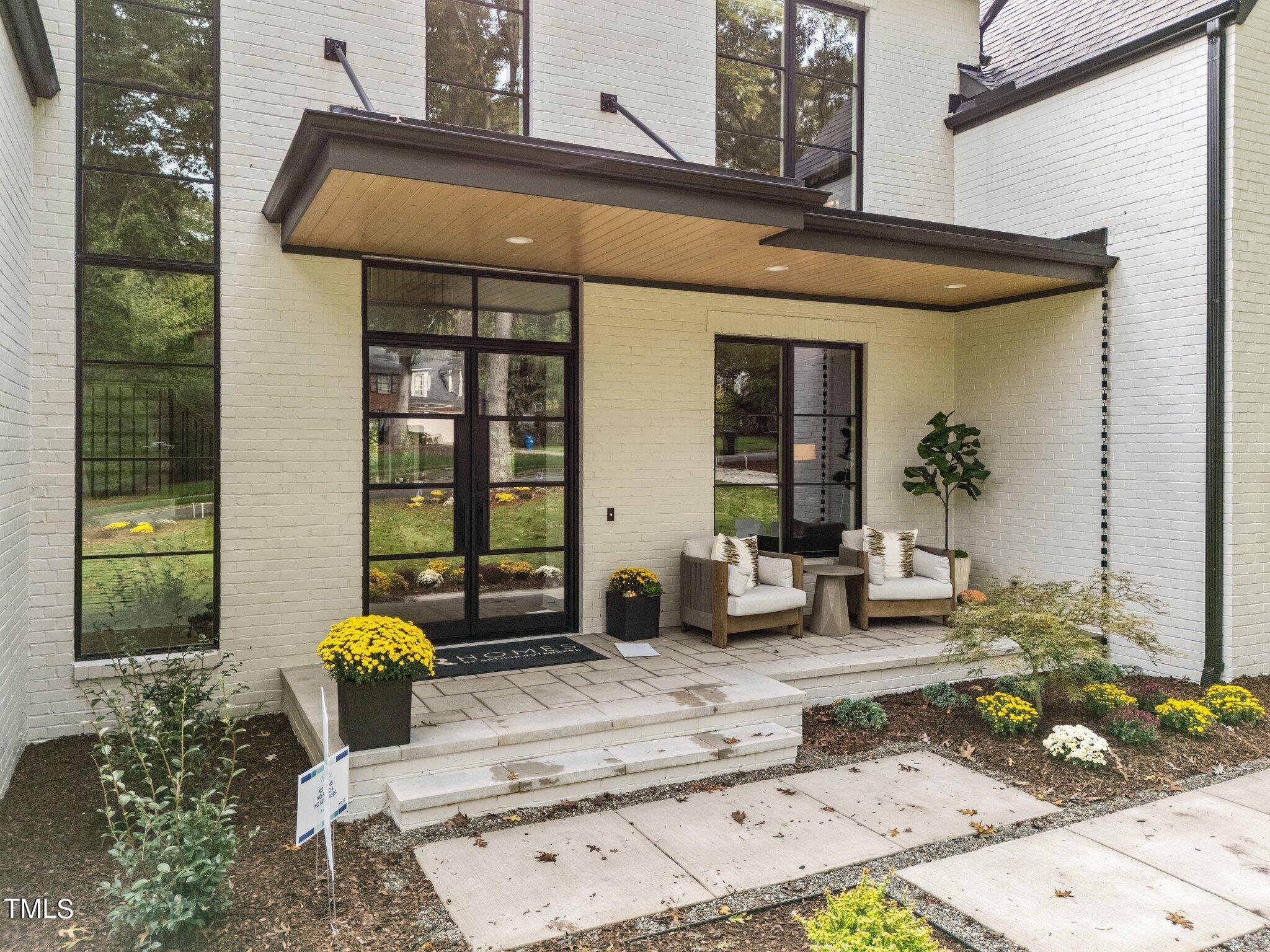 1308 Hedgelawn Way Raleigh, NC 27615 - Photo 3 of 58 60-web-or-mls-DJI_20241002110617_0867_D