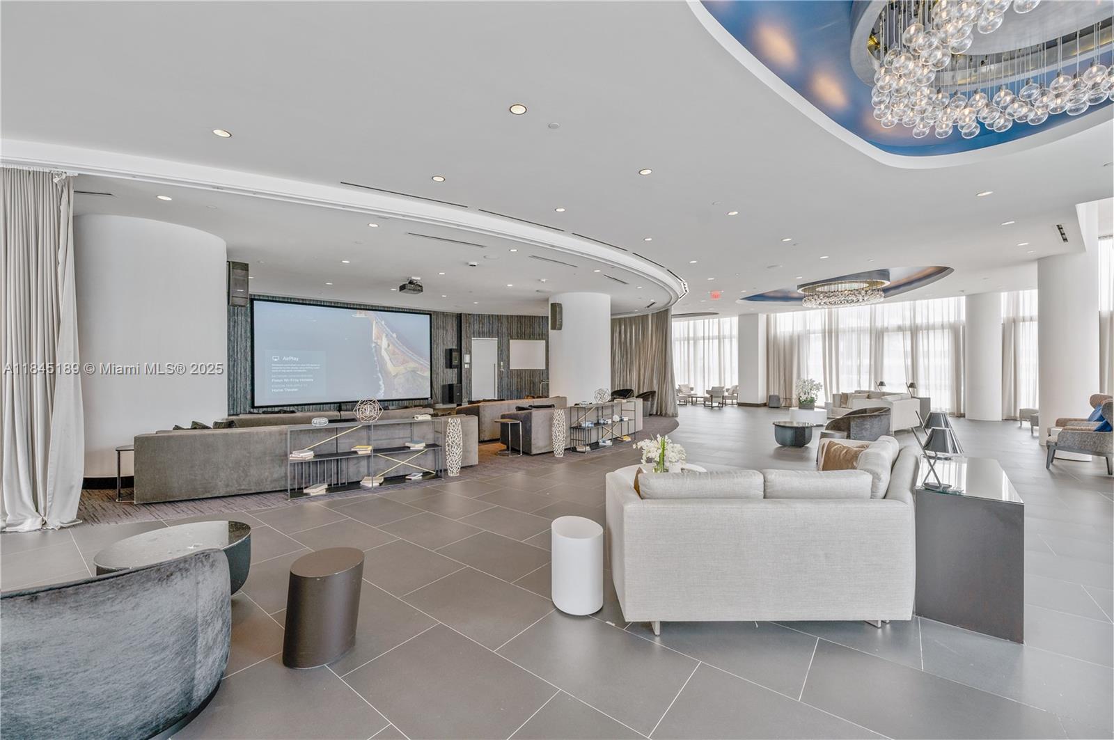 851 Northeast 1st Avenue, Unit 1410 Miami, FL 33132 - Photo 21 of 43 a living room with furniture and a large window