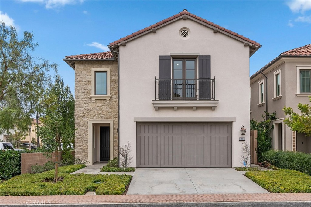 201 Fiore Irvine, CA 92602 - Photo 1 of 1 a front view of a house with yard