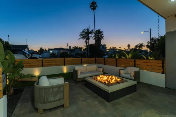 a outdoor living space with furniture and a potted plant