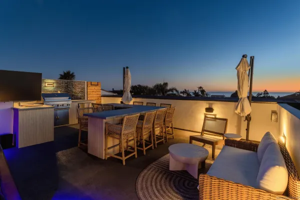 a view of a workspace with furniture and lounge chair