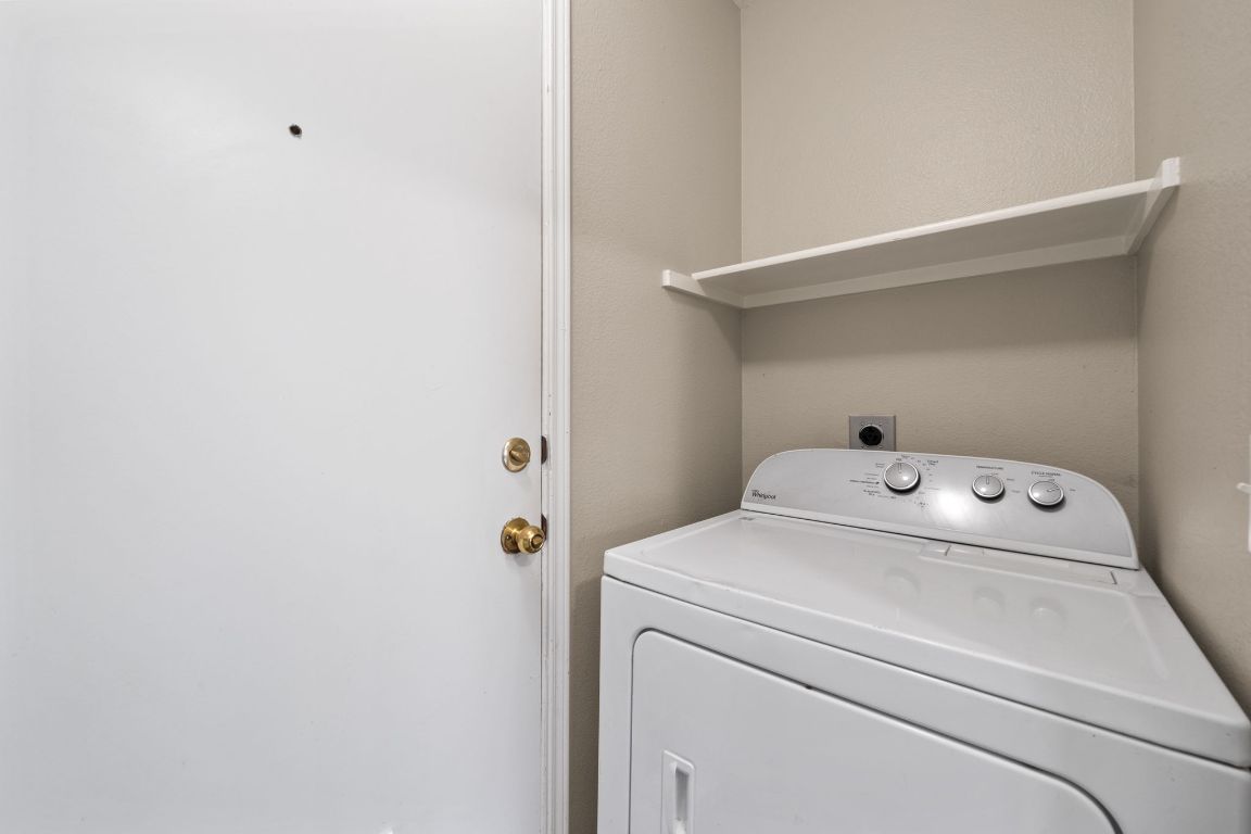 4904 Gnarled Oak Cove Austin, TX 78744 - Photo 24 of 38 a utility room with dryer and washer