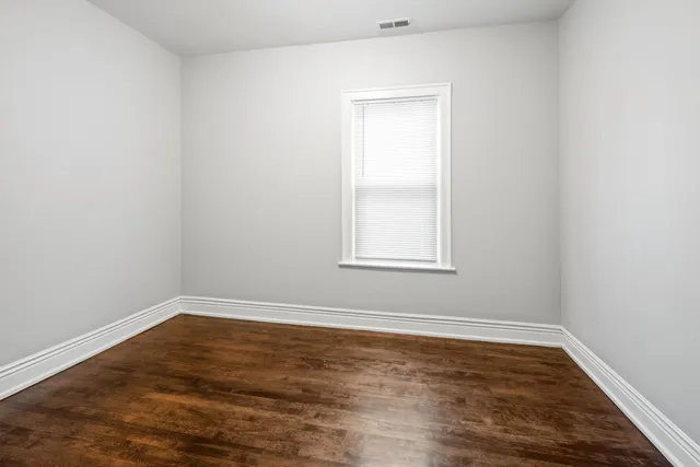 a view of a room that has a window in it