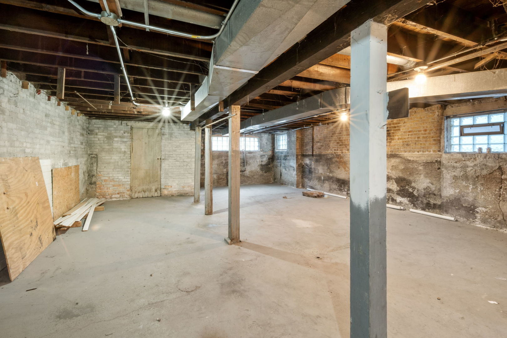 8548 South Exchange Avenue Chicago, IL 60617 - Photo 24 of 32 a view of a room with wooden walls