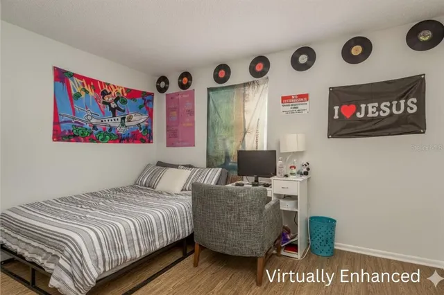 a living room with furniture a rug and a large window