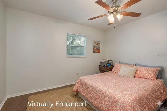 a bedroom with bed and window