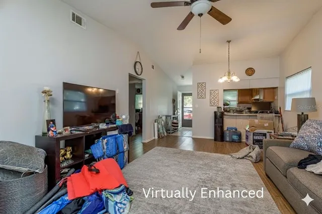 a bedroom with a bed and a bookshelf