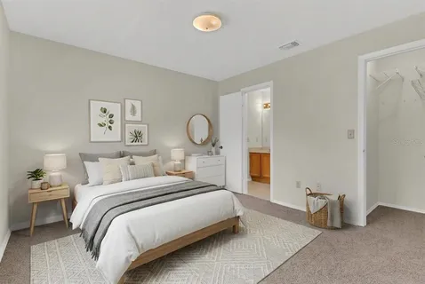 a blue and white umbrella sitting in a backyard