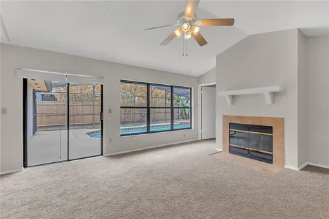 a view of a kitchen space with a window