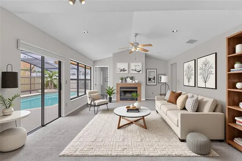 a bedroom with a bed and painting on the wall