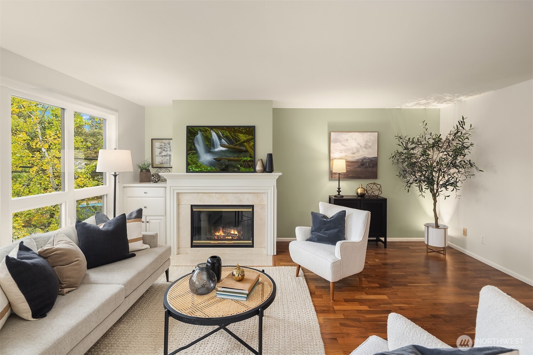 6300 Sand Point Way Northeast, Unit 212 Seattle, WA 98115 - Photo 12 of 21 a living room with furniture fireplace and a table