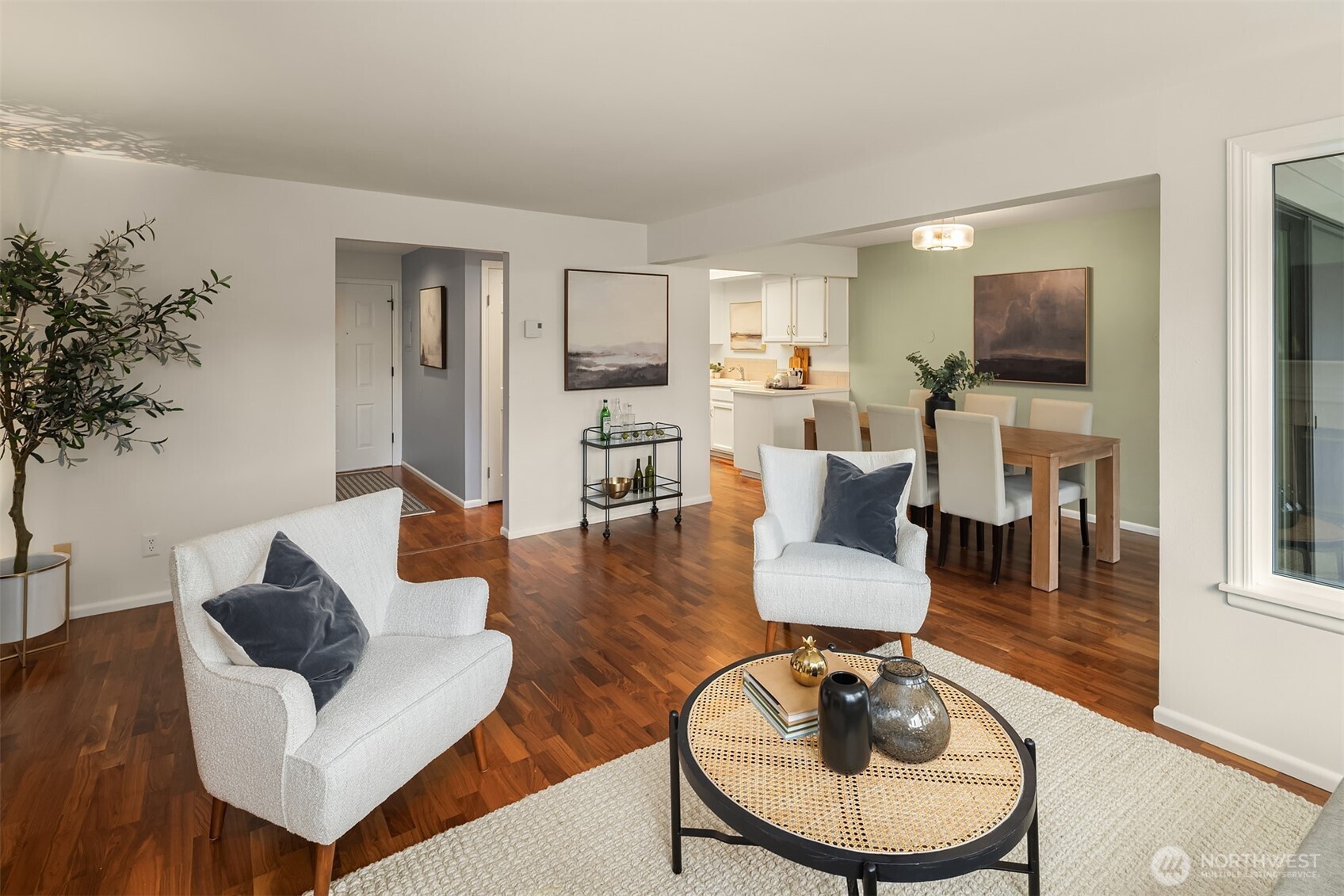 6300 Sand Point Way Northeast, Unit 212 Seattle, WA 98115 - Photo 13 of 21 a living room with furniture and a flat screen tv