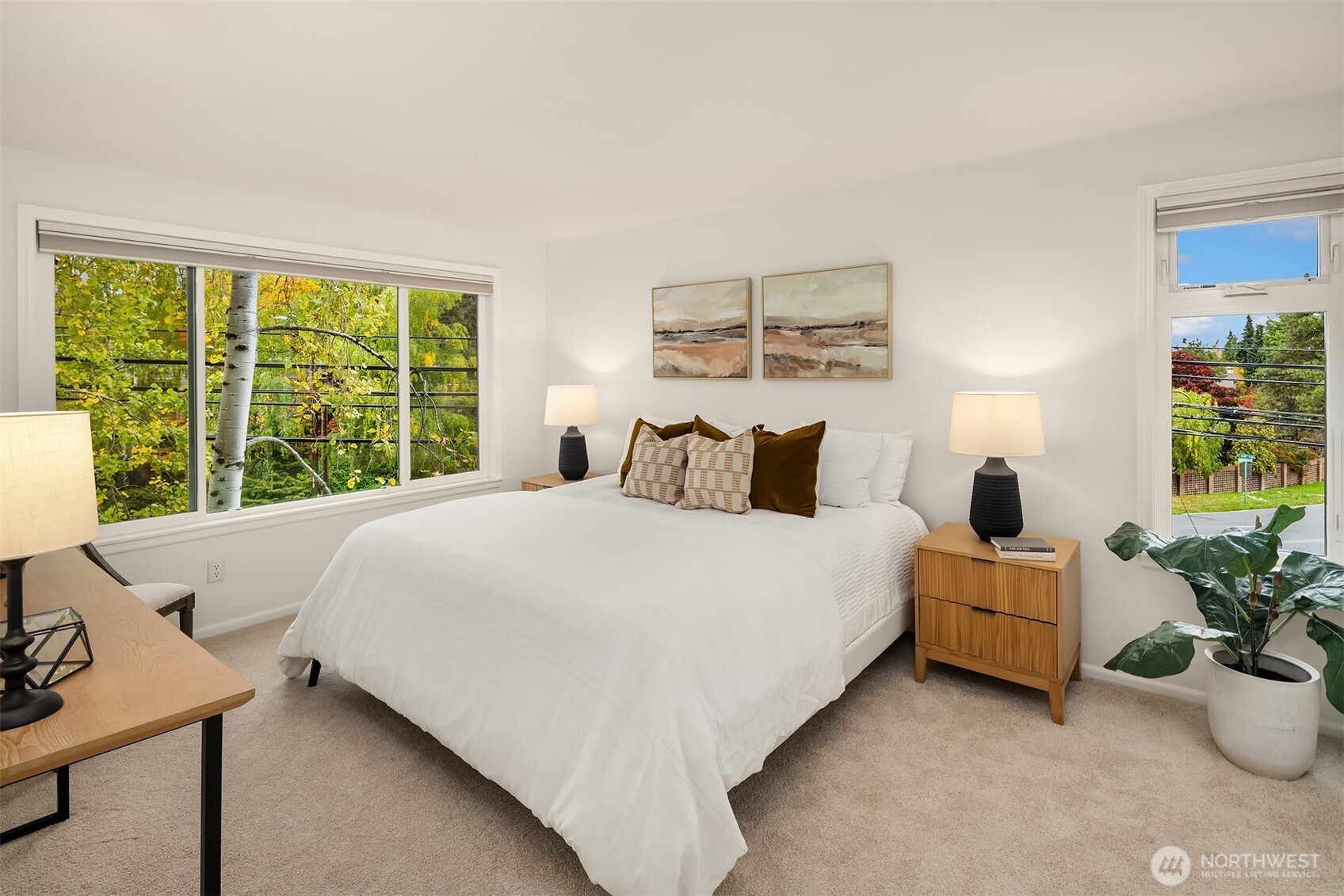 6300 Sand Point Way Northeast, Unit 212 Seattle, WA 98115 - Photo 15 of 21 a bedroom with a bed and a large window