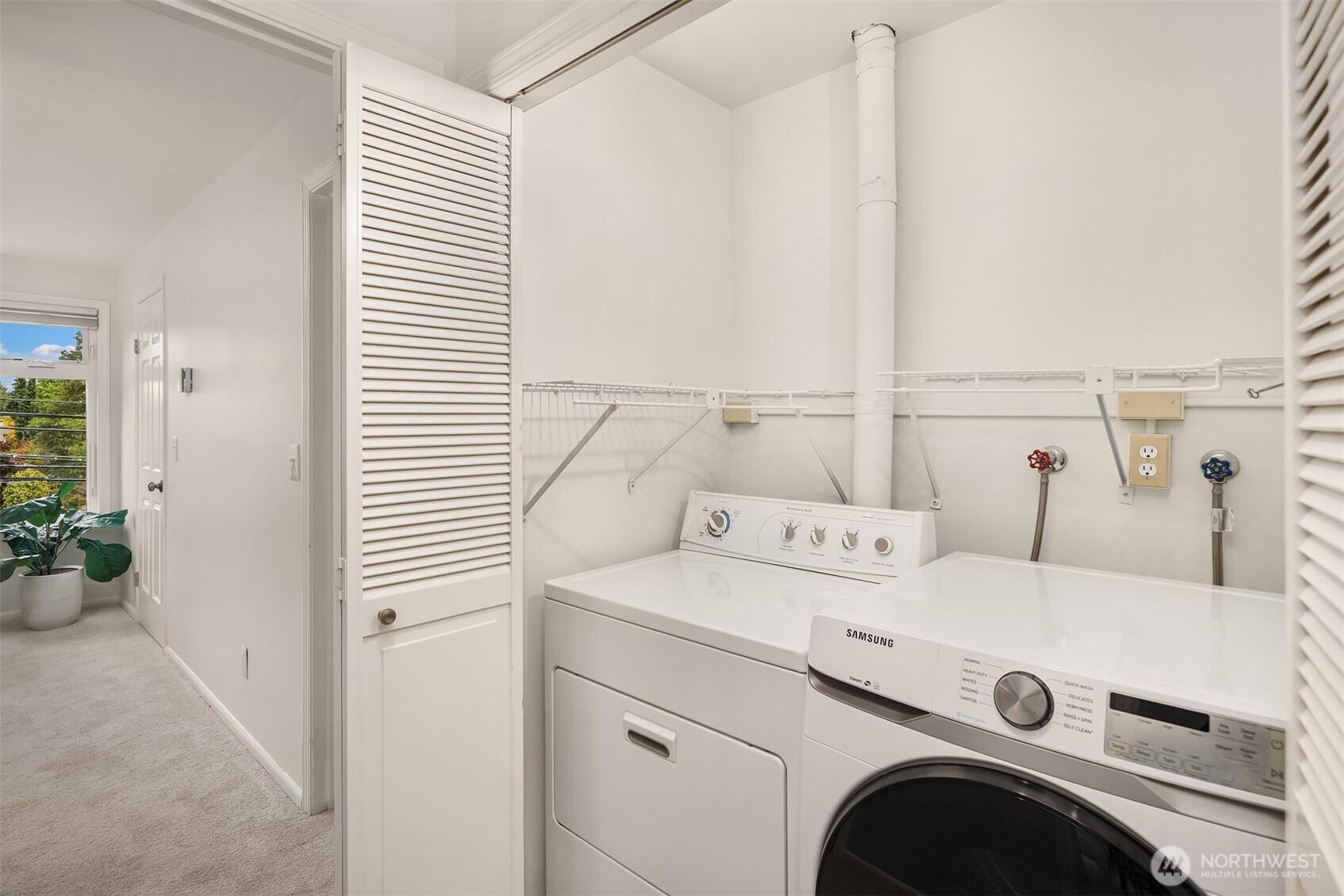 6300 Sand Point Way Northeast, Unit 212 Seattle, WA 98115 - Photo 20 of 21 a utility room with dryer and washer