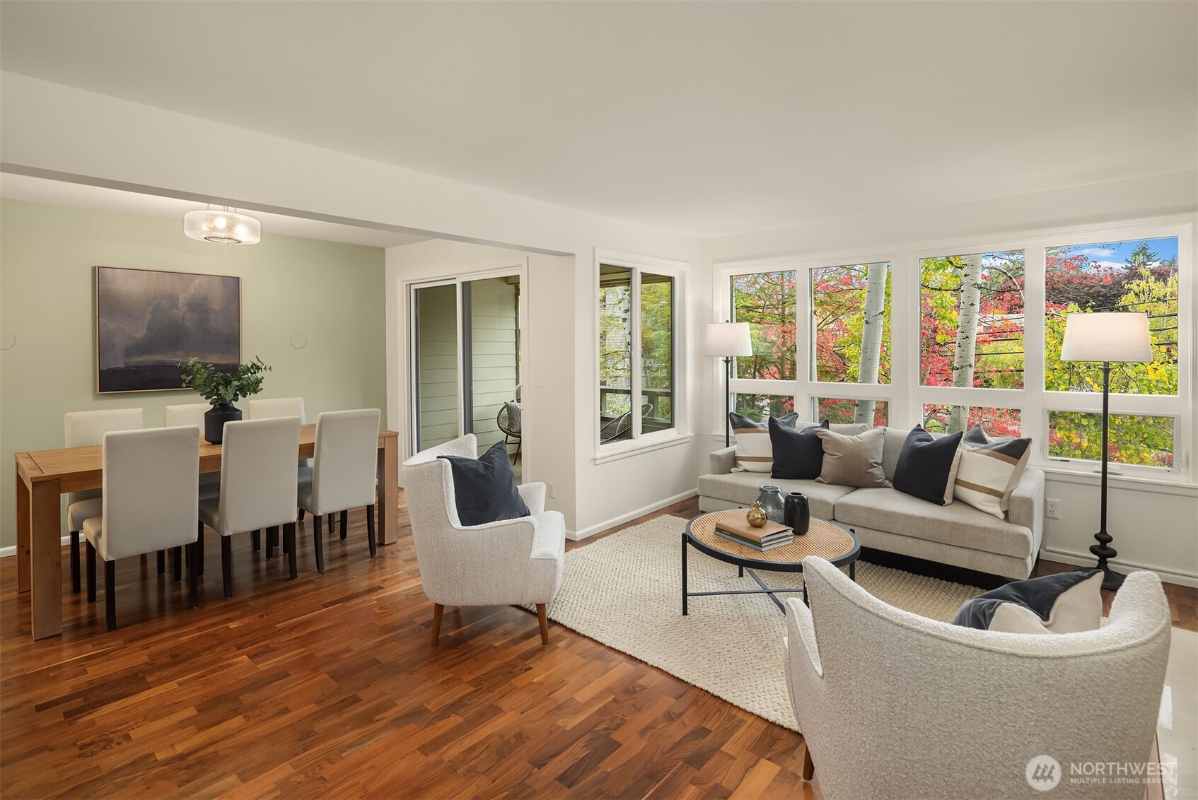 6300 Sand Point Way Northeast, Unit 212 Seattle, WA 98115 - Photo 3 of 21 a living room with furniture and a flat screen tv