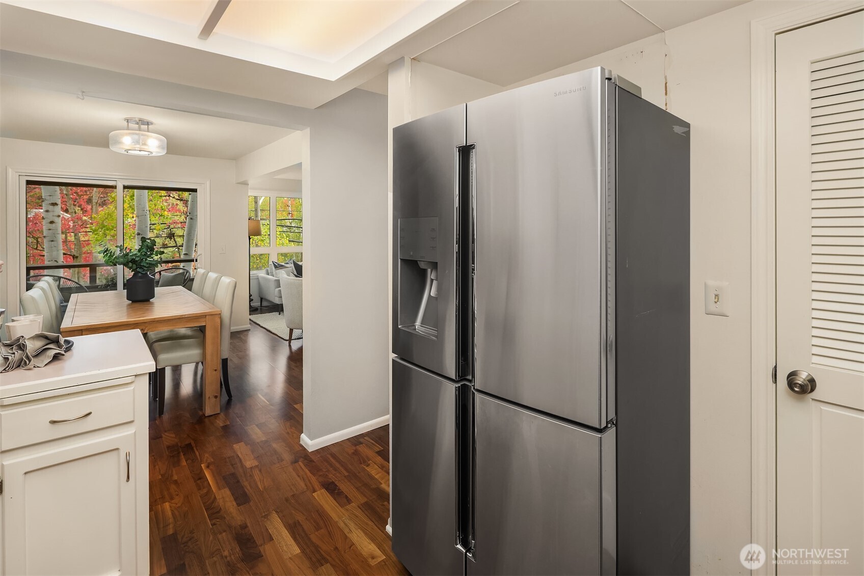 6300 Sand Point Way Northeast, Unit 212 Seattle, WA 98115 - Photo 8 of 21 a kitchen with stainless steel appliances a refrigerator and a stove top oven