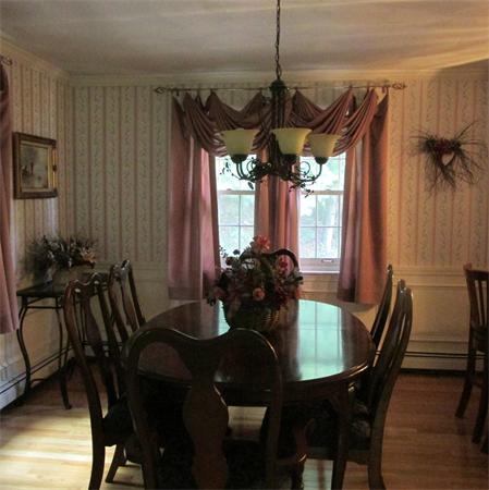 4 Raven Road Canton, MA 02021 - Photo 12 of 26 a view of a dining room with furniture and window