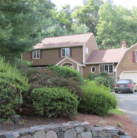 4 Raven Road Canton, MA 02021 - Photo 3 of 26 a view of a house with a garden